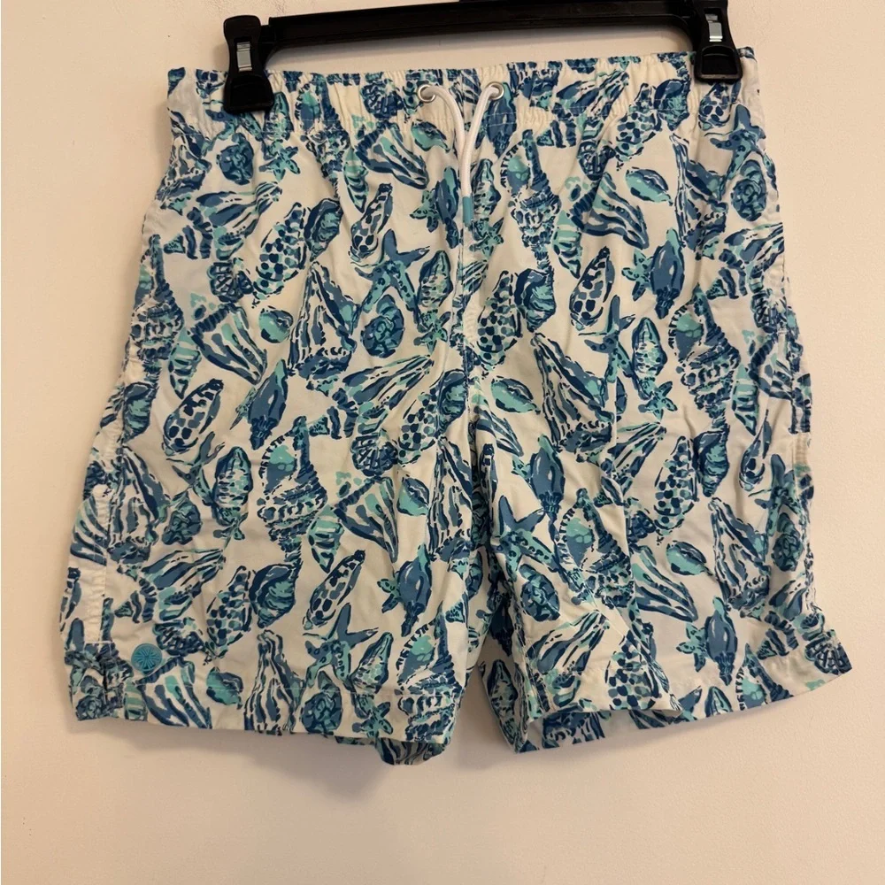 Lilly Pulitzer Kids White Swim Trunks with Blue Seashell Print